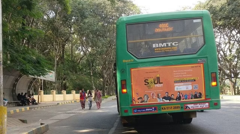 https://newsfirstprime.com/wp-content/uploads/2023/11/BMTC-Bus-Stop-Bengaluru.jpg