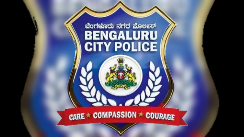 https://newsfirstprime.com/wp-content/uploads/2023/12/Bangalore_City_Police_Logo.jpg
